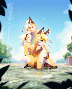 Two Little Foxes Having Fun