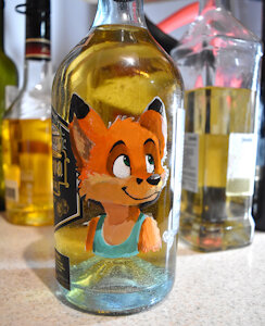 Gigi Over a Tequila Bottle